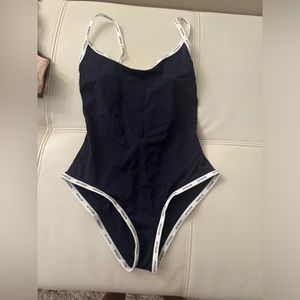 Never worn black and white womans one piece